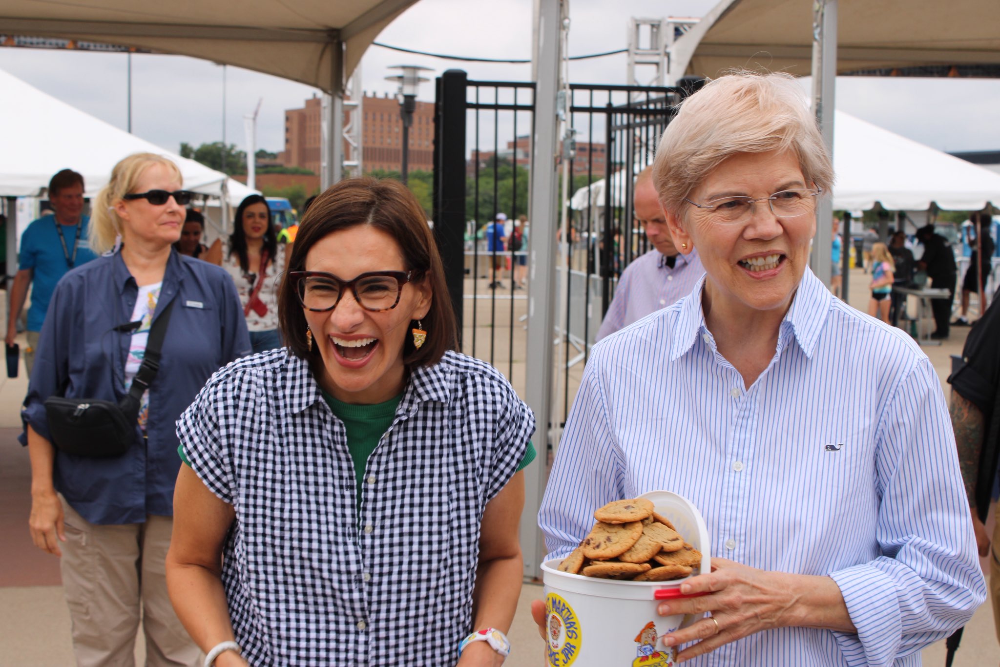 Peggy and Elizabeth Warren sharing a bucket of cookies